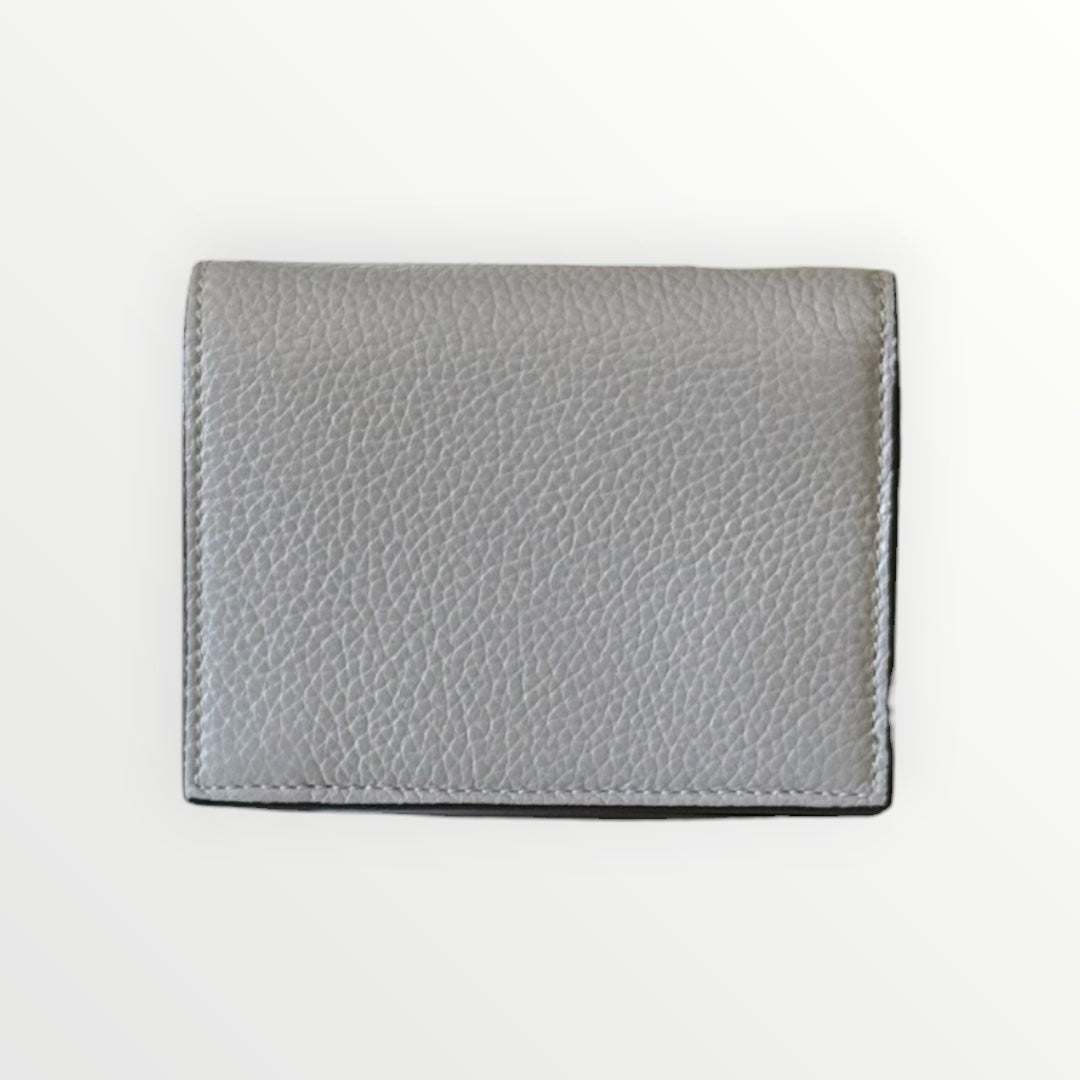 FERRAGAMO GANCIO CITY PEBBLED LEATHER COMPACT WALLET